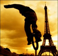 Unicycle against Eiffel Tower backdrop